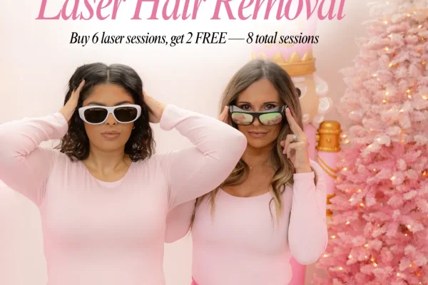 Two women smiling outdoors after receiving laser hair removal treatments in Modesto, CA.