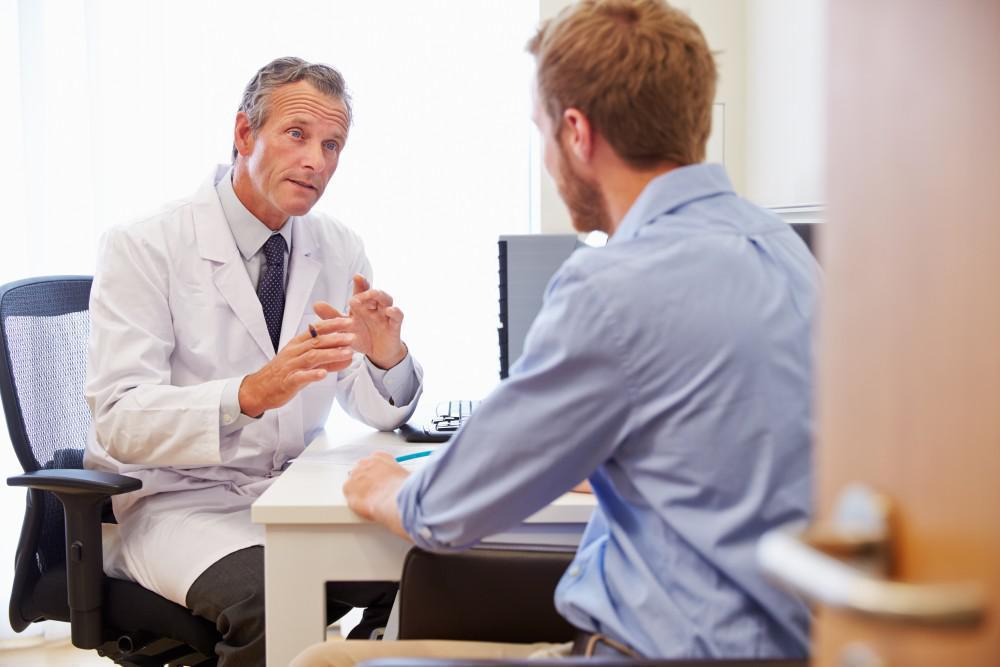 image of Doctor talking to his patient