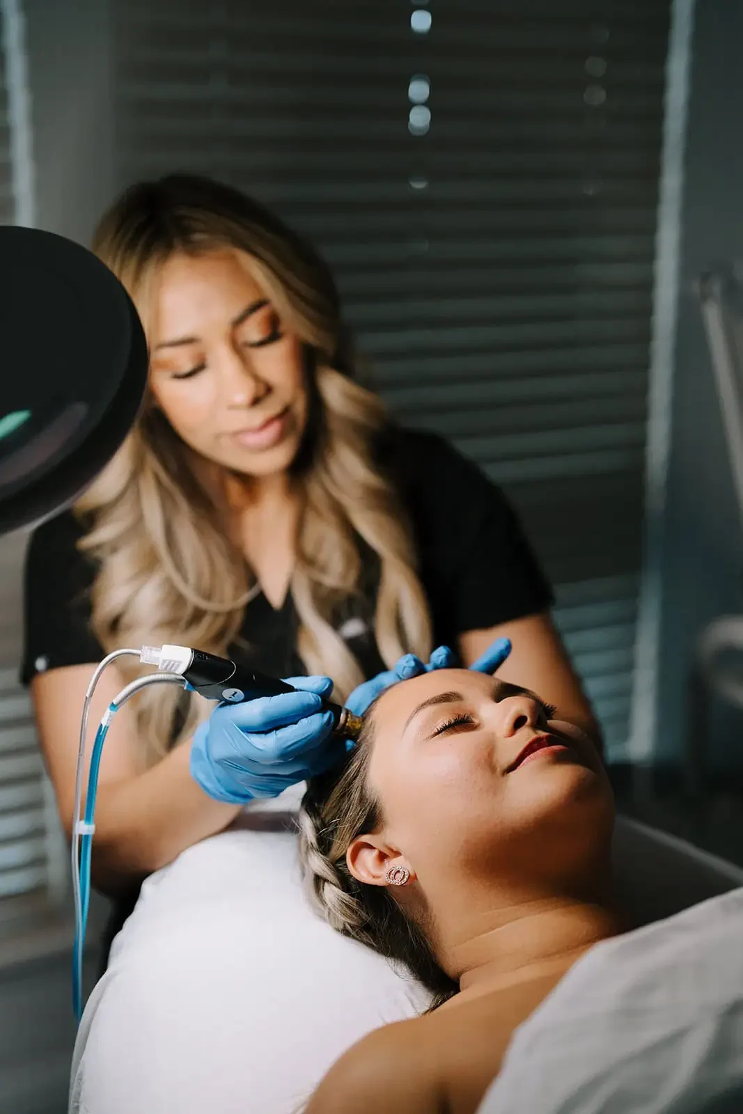 Client receiving Hair Restoration treatments in Modesto, Turlock, Stockton, CA at Aesthetic Lab